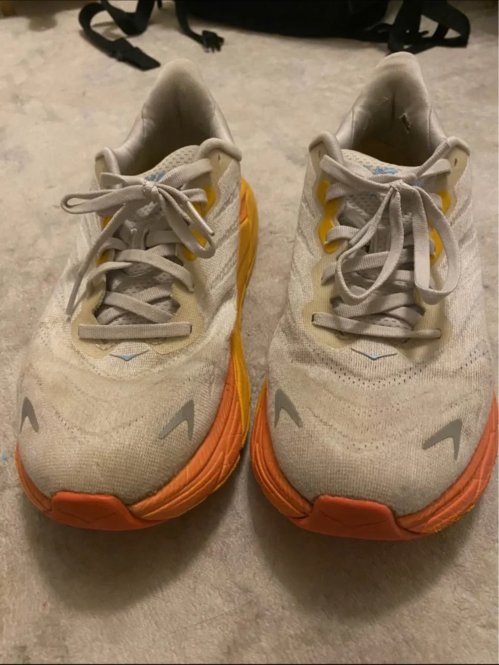 Hoka Womens Sneaker — White Upper with Yellow and Orange Sole